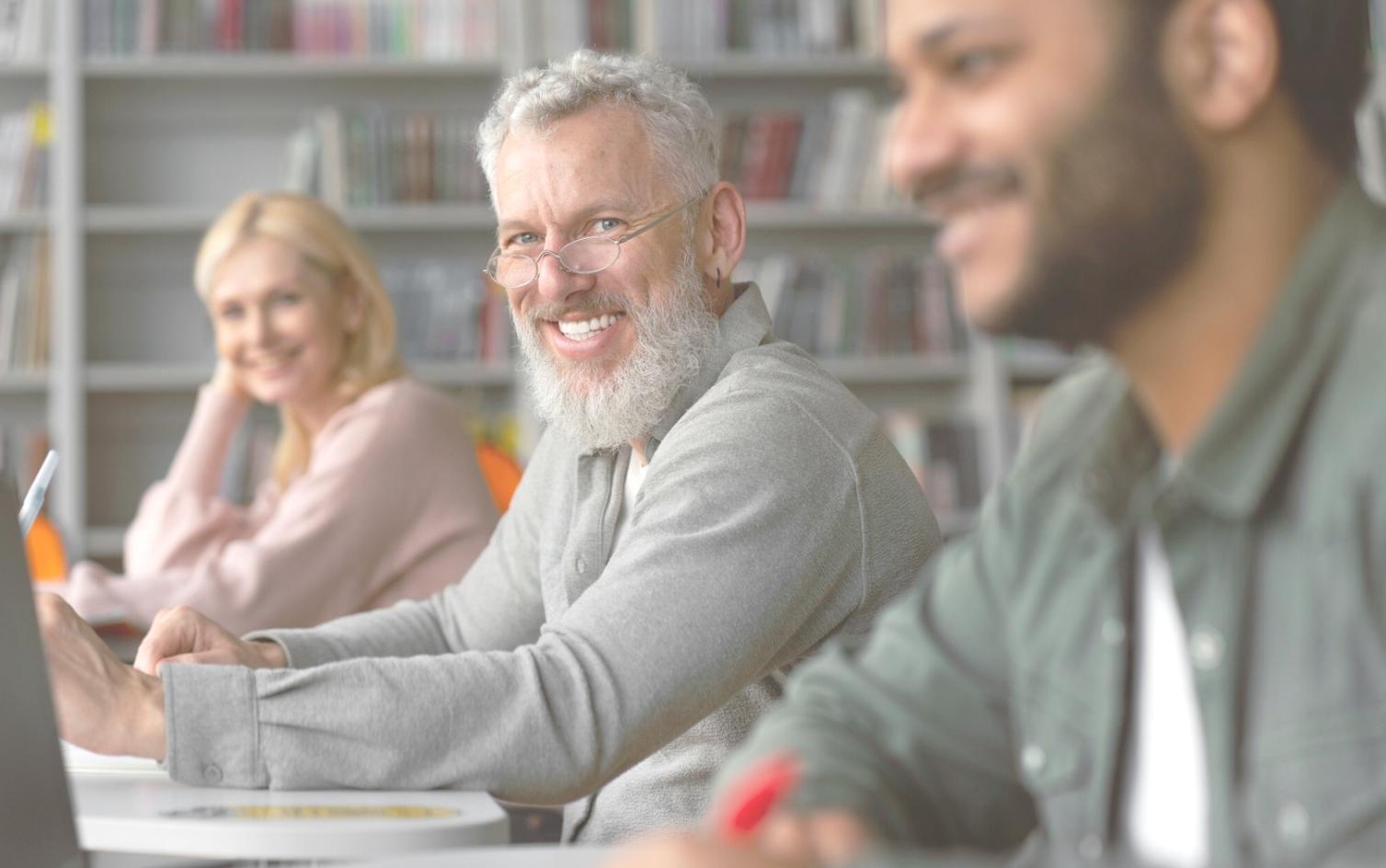 Professional financial workshop setting with participants collaborating